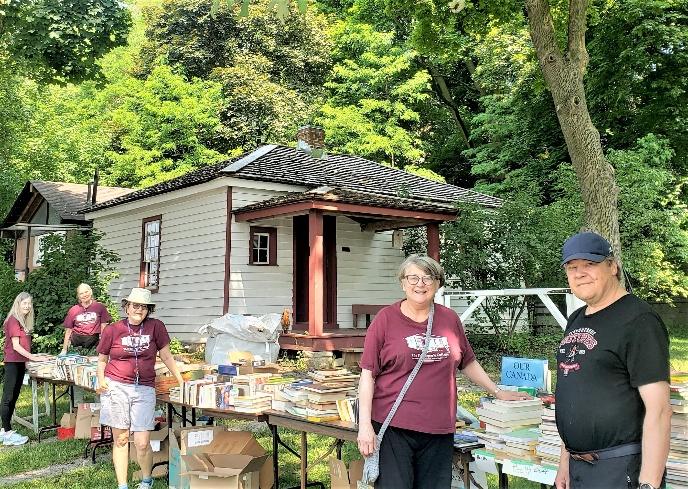 Outdoor book sale at the Tollkeeper's Cottage in June